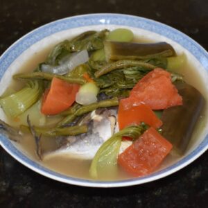 Sinigang na danggit is a popular Filipino dish made of fish, vegetables, and a tangy broth. The term "sinigang" means to stew in a sour broth. Traditionally flavored with tamarind, it can also use calamansi, guava, or kamias for its signature sour taste.