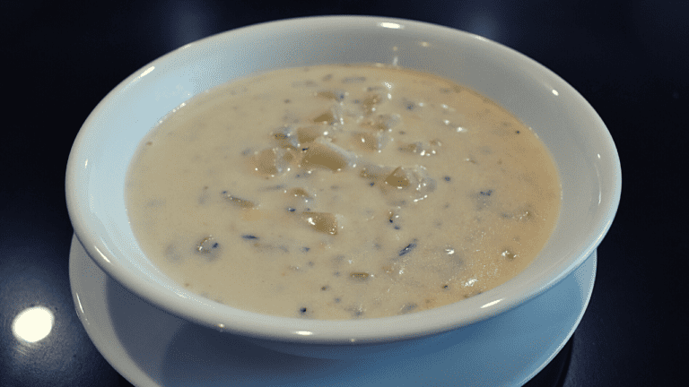 Clam chowder is a type of soup that originated in New England and is made with clams, broth or milk, potatoes, onions, and other ingredients such as bacon or salt pork. It can also include seasonings like thyme or bay leaves.