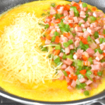 Omelette is a dish made by beating eggs and cooking them in a pan until they are set. It can be filled with various ingredients such as vegetables, cheese, meat, or herbs before folding it over and serving it. Omelettes can be cooked in different styles including French, Spanish, or American.
