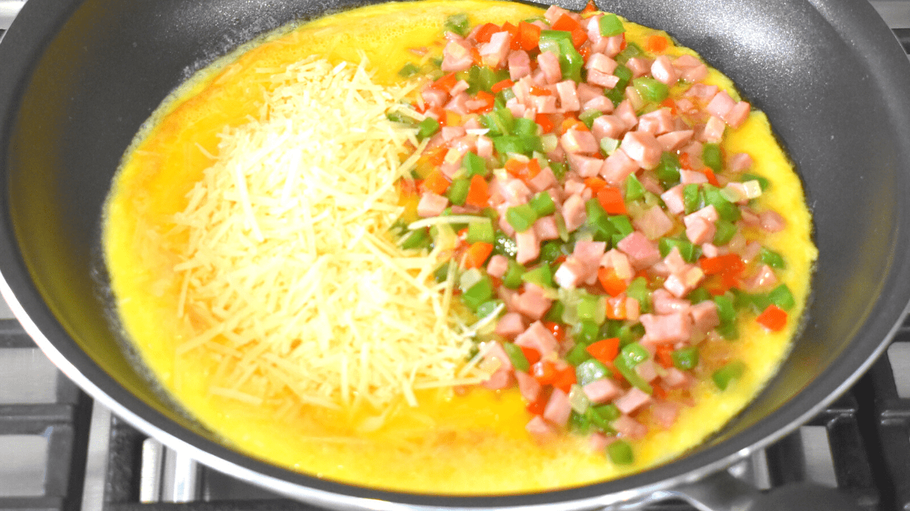 Omelette is a dish made by beating eggs and cooking them in a pan until they are set. It can be filled with various ingredients such as vegetables, cheese, meat, or herbs before folding it over and serving it. Omelettes can be cooked in different styles including French, Spanish, or American.