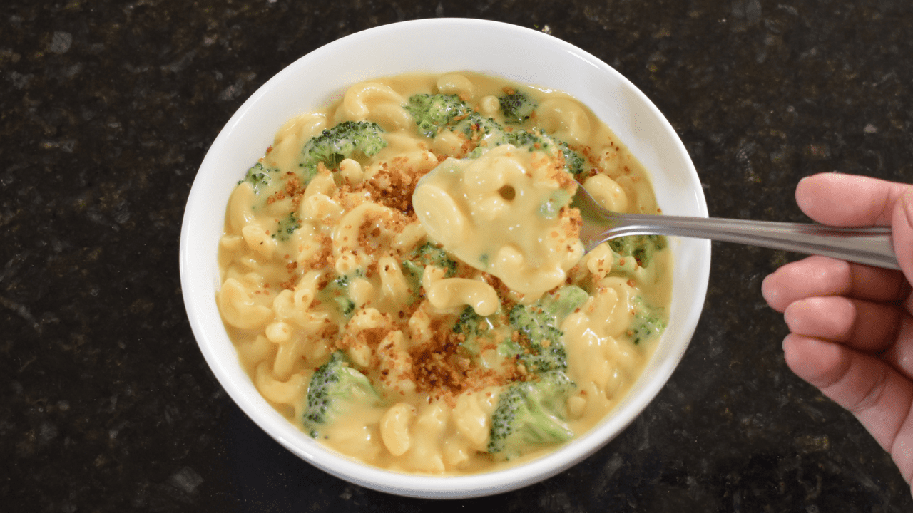 Mac and cheese with broccoli is a classic American dish typically made by combining macaroni pasta with a creamy cheese sauce and fresh or cooked broccoli.
