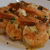 Garlic butter shrimp is a delicious and flavorful seafood dish that can be made with ease at home. The recipe combines succulent shrimps, butter, garlic, and various herbs and spices to make a delightful meal.