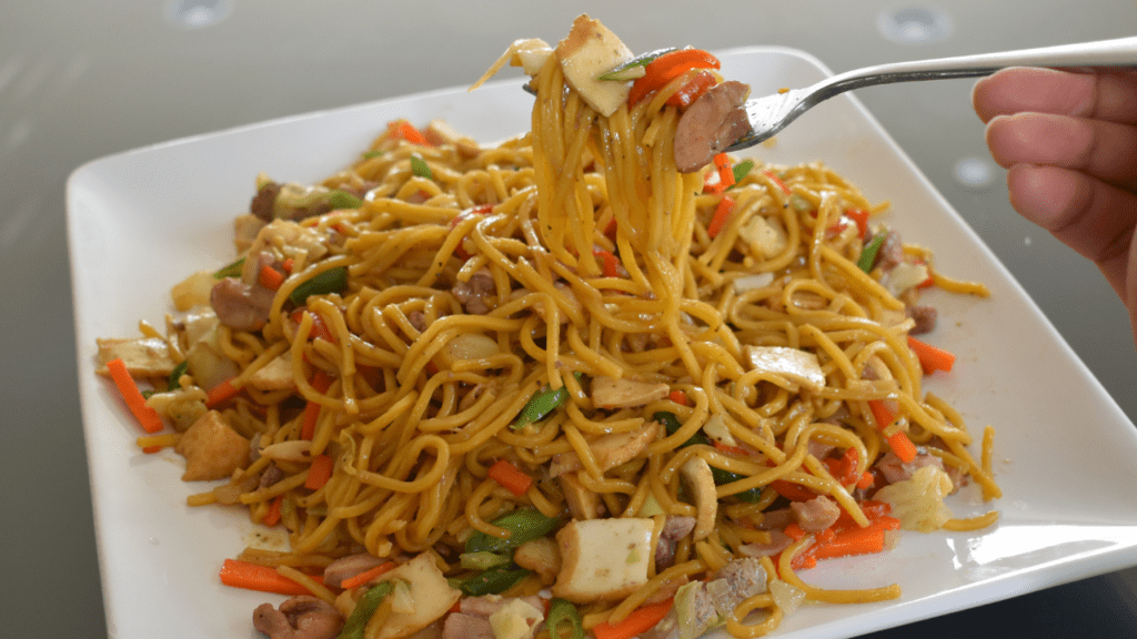 Pancit Canton is a traditional Filipino dish made from egg noodles, vegetables, and meats. It’s one of the most popular street food in the Philippines, and can be found in most Filipino households.
