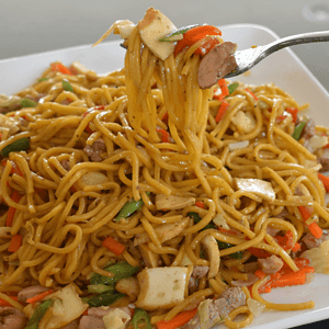 Pancit Canton is a traditional Filipino dish made from egg noodles, vegetables, and meats. It’s one of the most popular street food in the Philippines, and can be found in most Filipino households.