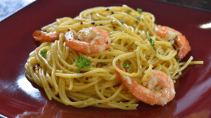 Spaghetti Shrimp Scampi is a classic Italian-American dish made with cooked spaghetti, shrimp, garlic, butter and white wine.