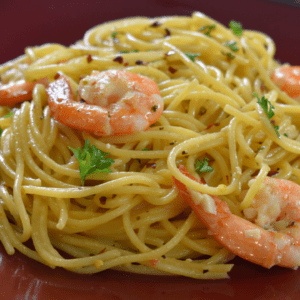 Spaghetti Shrimp Scampi is a classic Italian-American dish made with cooked spaghetti, shrimp, garlic, butter and white wine.