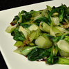 Bok choy stir fry is a popular Chinese dish made with bok choy (a type of Chinese cabbage), stir fried with various vegetables and sometimes meat or tofu. It is typically cooked in a wok or frying pan with oil, garlic, ginger, and soy sauce for flavor.