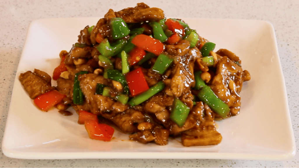 Kung Pao chicken is a popular Chinese dish that consists of diced chicken, peanuts, and vegetables in a spicy sauce.