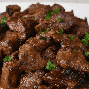 Buttery Garlic Steak Bites are a mouthwatering dish that combines perfectly cooked chunks of tender beef with a rich and flavorful garlic butter sauce.