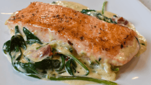 Creamy Tuscan Salmon is a mouth-watering Italian dish that combines the richness of cream sauce with the delicate flavor of salmon. The dish originated in Tuscany, a region known for its exquisite cuisine and culinary traditions.