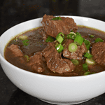 Beef Pares is a famous Filipino dish that originated from the streets of Manila. It is a combination of tender beef, sweet and savory sauce, and garlic fried rice, making it a mouth-watering meal that has captured the hearts and palates of many people.