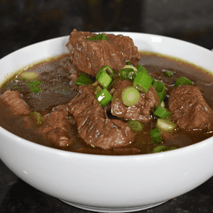 Beef Pares is a famous Filipino dish that originated from the streets of Manila. It is a combination of tender beef, sweet and savory sauce, and garlic fried rice, making it a mouth-watering meal that has captured the hearts and palates of many people.