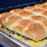 Cheeseburger sliders are a delicious and convenient twist on the classic American burger. These mouth-watering mini burgers consist of a juicy beef patty, melted cheese, and various toppings sandwiched between two soft slider buns.