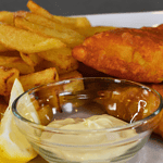 Fish and chips is a classic British dish that has been enjoyed for centuries. It consists of battered and deep-fried fish, usually cod or haddock, served with crispy fries (chips).