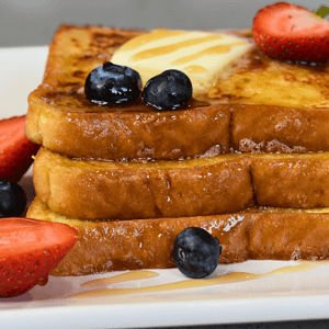 French toast, also known as "eggy bread" or "pain perdu" in French, is a popular breakfast dish that originated from Western Europe. It is made by soaking slices of bread in a mixture of beaten eggs and milk, then frying them until they are golden brown on both sides.