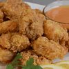 Fried shrimp is a popular and delicious seafood dish enjoyed by people all over the world. It is made by coating fresh or frozen shrimp in a crunchy batter and frying them until golden brown and crispy.