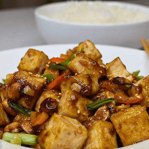 Kung pao tofu is a delicious and popular Chinese dish that originated in the Sichuan province. It is a flavorful and spicy stir-fry made with tofu, peanuts, vegetables, and a variety of sauces.