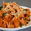 Pasta alla vodka is one of the most delicious and indulgent dishes in Italian cuisine. It's a perfect blend of creamy tomato sauce, hearty pasta, and a kick of vodka that elevates the flavors to a whole new level.