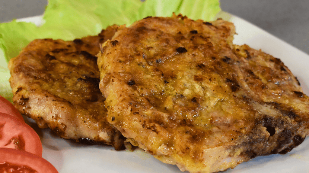 Fried pork chop, also known as pan-fried or country-style pork chops, is a popular dish in many cultures around the world. It is a type of meat, specifically pork, that is cut into thin slices and then coated in flour or breadcrumbs before being fried in oil until it turns golden brown.