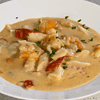 Crab and Shrimp Seafood Bisque is a delectable and rich soup that originated in France. It is traditionally made with fresh crab meat, shrimp, cream, and seasonings to create a velvety smooth texture that will tantalize your taste buds.