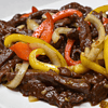 Beef stir fry is a popular dish that combines tender beef, savory onions, and crisp bell peppers into one flavorful meal. This delicious dish has its roots in Asian cuisine, but has become a household favorite all around the world.